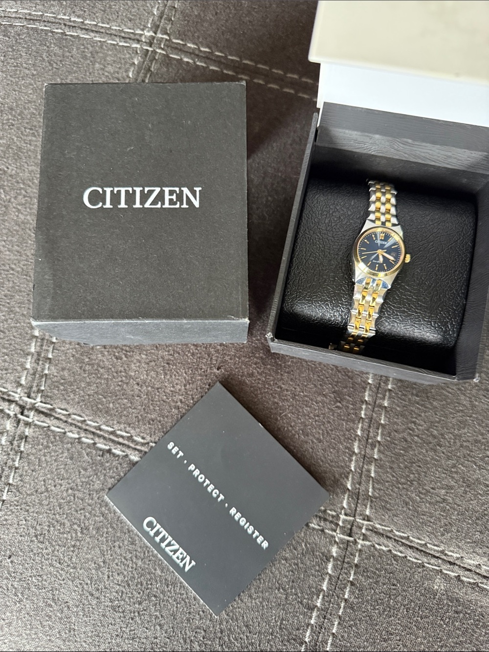 Citizen Eco-Drive Two-Tone Watch withBlue Dial and Gold Accents